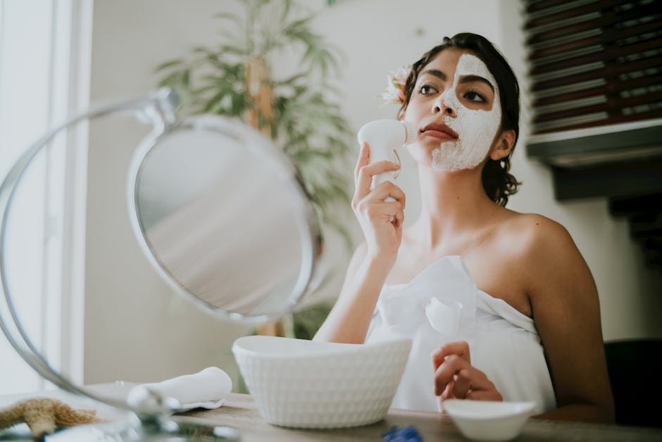 Adelaide medi-spa dermaplaning treatment with sterile blade gently exfoliating patient cheek