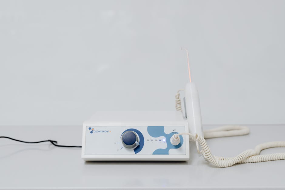 Adelaide HydraFacial treatment in progress with vortex tip on patient cheek