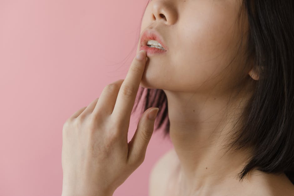 Adelaide cosmetic clinician marking masseter muscle treatment area on patient jawline